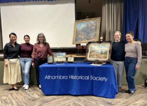 From left to right, Alhambra Councilwoman Noya Wang joins presenters Jocelyne Bravo, Joyce Amaro, Chris Olson, and Anais Rallion. They are standing with original artwork by two renowned early Alhambra women artists — Florence Young and Josephine Romano Lyden. (Photo courtesy of Alhambra Historical Society)